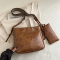 Vintage brown leather bucket bag set with patterned wide strap and tassel detail - Tan
