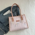 Pink tote bag with wave embroidery and diamond texture on a clean white background - Pink