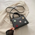 Black handbag with colorful heart decorations and crossbody strap for women - Black