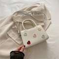 Stylish white minimalist crossbody handbag with colorful stitched heart patches design - Off White
