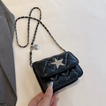 Black quilted mini chain bag with sparkling rhinestone star detail and silver charm - Black