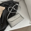 Mini sac bandoulière argenté avec nœud métallique et fine bandoulière corde - Argent