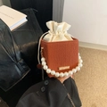 Brown textured bucket bag with pearl handle, drawstring liner and gold chain strap - Brown