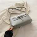 Chic silver-grey faux leather rectangular crossbody bag with golden hardware details - Silver