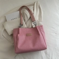 Pink woven tote bag with leather straps and metal chain detail for women - Pink