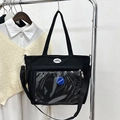 Black casual tote bag with transparent front pocket and Lucky Fashion logo detail - Black