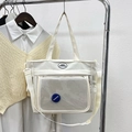 Cream white canvas tote bag with adjustable strap and mesh pocket for women - Off White