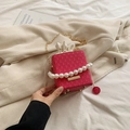 Rose pink waffle textured bucket bag with elegant pearl handle and gold chain strap - Pink