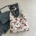 White tote bag with red butterfly and star constellation print in textured faux leather - Red