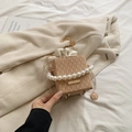 Elegant apricot woven bucket bag with pearl handle and golden chain strap - Khaki