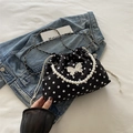 Polka dot bucket bag with white pearl handle and silver bow decoration - Black