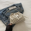 Cream polka dot bucket bag with pearl handle and silver butterfly charm detail - Off White