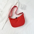 Red half-moon crossbody bag in waterproof nylon with black adjustable strap and dual zippers - Red