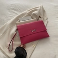 Umschlag-Handtasche aus rosafarbenem PU-Leder mit silberner Schleifenverzierung - Rosenrosa