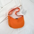 Minimalist vibrant orange crescent crossbody bag with adjustable nylon shoulder strap - Orange
