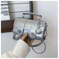 Detailed view of silver metallic mini bag with eel skin texture and double turn-lock design - Silver With Pendant