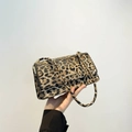 Chic leopard print rectangular shoulder bag with golden hardware and flap closure - Yellow
