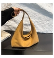 Detail of camel suede tote bag showing soft texture and spacious commuting design - Brown