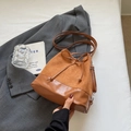 Brown two-tone bucket bag featuring suede and leather paneling with drawstring closure - Basic Style / Brown