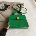 Chic green crocodile pattern handbag with gold hardware and smooth leather flap details - Green