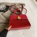 Elegant red crocodile pattern handbag with gold hardware and removable shoulder strap - Red