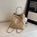 Beige velvet bucket backpack with drawstring bow and plush monster pendant - Off-white with Pendant
