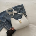 Chic white crescent hobo bag in faux leather with golden oval rotating metal lock - White