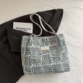 Green and white striped woven tote bag with white leather straps and fashion label - Green Without Charm