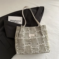 Olive green and cream woven tote bag with abstract stripes and slim shoulder straps - Yellow Without Charm