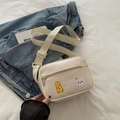 Chic cream white rhombic chain crossbody bag featuring cute rabbit and cheese graphic - Off White