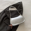 Borsa baguette argento metallizzato con texture crackle e finiture dorate su tessuto - Argento