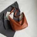 Minimalist caramel brown PU leather crescent hobo bag with adjustable shoulder strap - Brown
