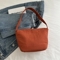 Minimalist reddish brown nylon bucket bag in a casual shoulder style for daily use - Orange