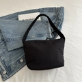 Japanese style black bucket bag in textured fabric with thick shoulder handle - Black