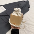 Mini beige woven bucket bag with pearl handle, drawstring pouch, and gold chain strap - Khaki