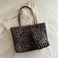 Fashionable leopard print tote bag with matching pouch and dark brown rivet handles - Brown