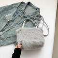 Chic gray plush crossbody bag for women featuring soft faux fur and leather straps - Gray