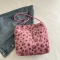 Plush pink shoulder bag featuring a stylish heart leopard print and faux fur texture - Pink