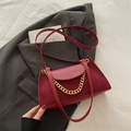 Retro burgundy corduroy chain bag for women with gold strap on dark gray suit background - Red