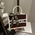 Borsa tote in velluto leopardato con fiocco e manici in pelle bianca per donna - Rosso