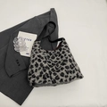 Retro grey leopard print plush shoulder bag with smooth black faux leather strap - Off White