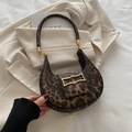 Chic leopard print crescent shoulder bag with golden metallic buckle on blazer - Brown