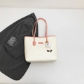Cream and pink leather tote bag with a cute plush charm for daily commute and fashion - With Pendant / Pink