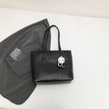 Large black houndstooth tote bag with embossed letter patterns and plush charm - With Pendant / Black