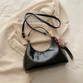 Black wax leather hobo bag with adjustable strap and cute plush bear charm - Black with Charm
