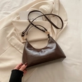 Dark brown oil wax leather crescent shoulder bag with adjustable strap and gold hardware - Coffee without Charm
