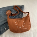 Brown corduroy crossbody bag with adjustable strap and small coin pouch attachment - Brown
