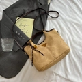 Chic camel faux suede bucket bag with dark brown leather trim and metal triangle detail - Coffee With Pendant