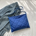 Royal blue quilted tote bag with diamond pattern and crossbody strap for women - Blue