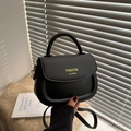 Chic black faux leather saddle bag with yellow fashion lettering and crossbody strap - Black